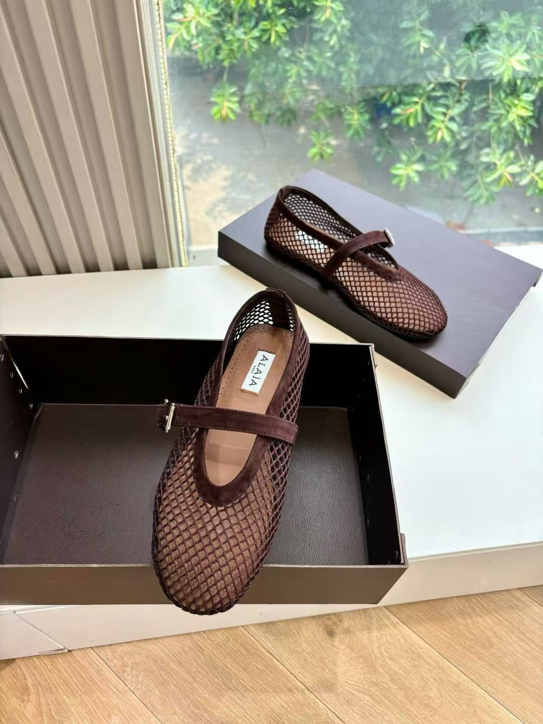 UA ALAÏA BALLET FLATS IN FISHNET