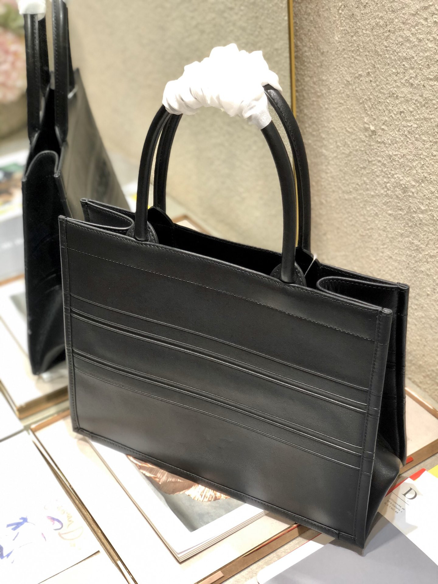 calfskin embossed medium D*or book tote black 14 x 11 x 6.5 inches