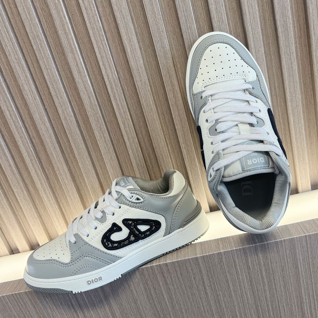 ua D*or b57 low-top sneaker gray and white