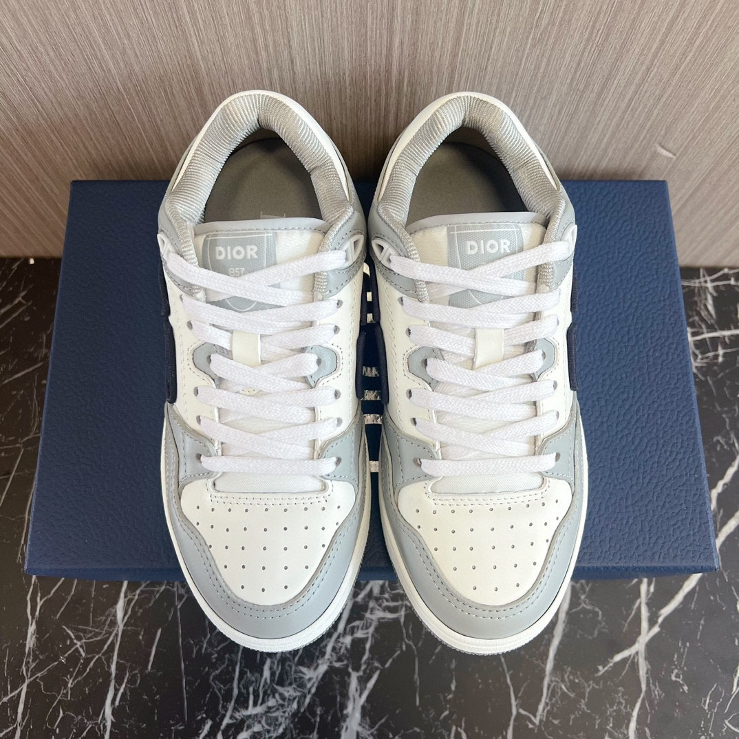 ua D*or b57 low-top sneaker gray and white