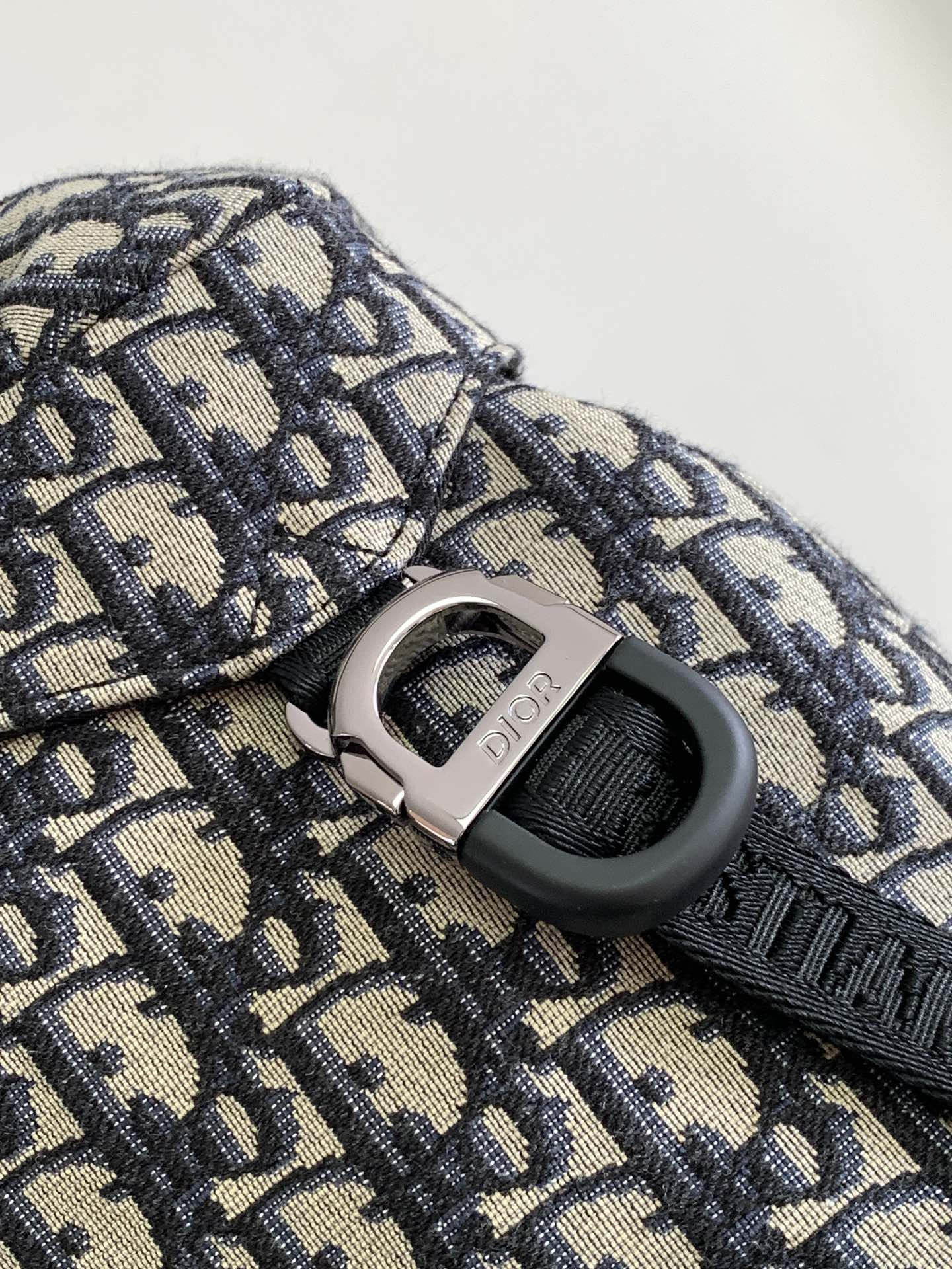 D*or 8 backpack with flap beige and black D*or oblique jacquard 31 x 48 x 16.5 cm