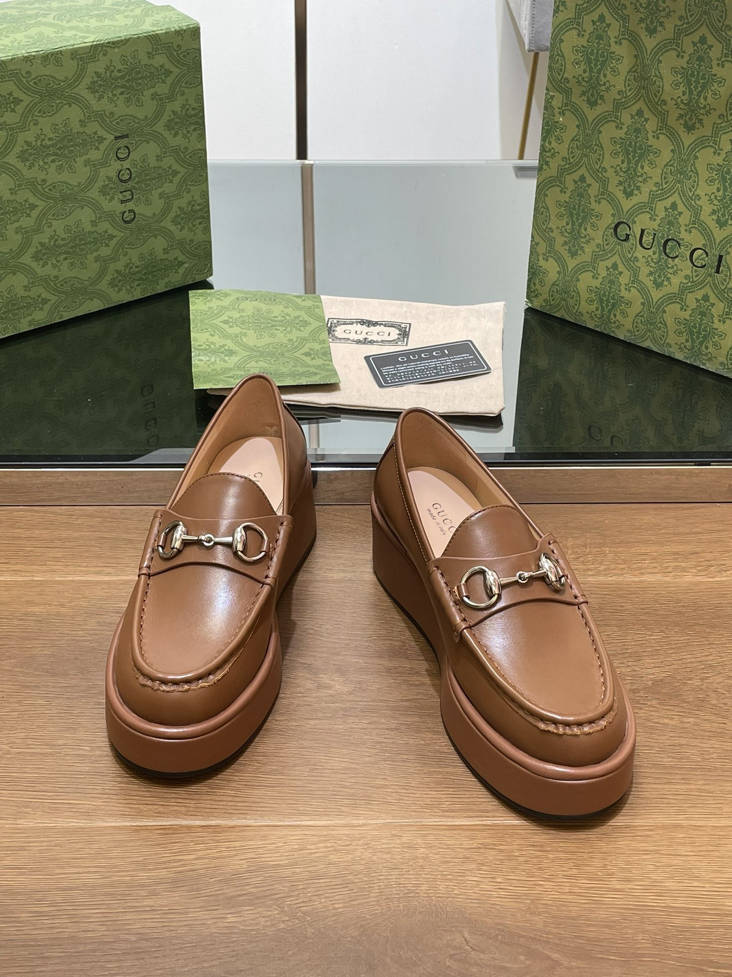 ua G*u*i horsebit wedge loafer