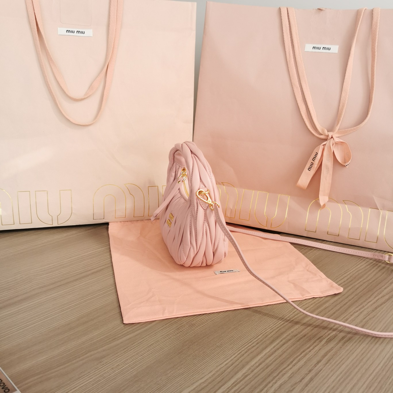 Miu Miu Wander matelassé nappa leather hobo mini-bag 14x17.5x5.5cm