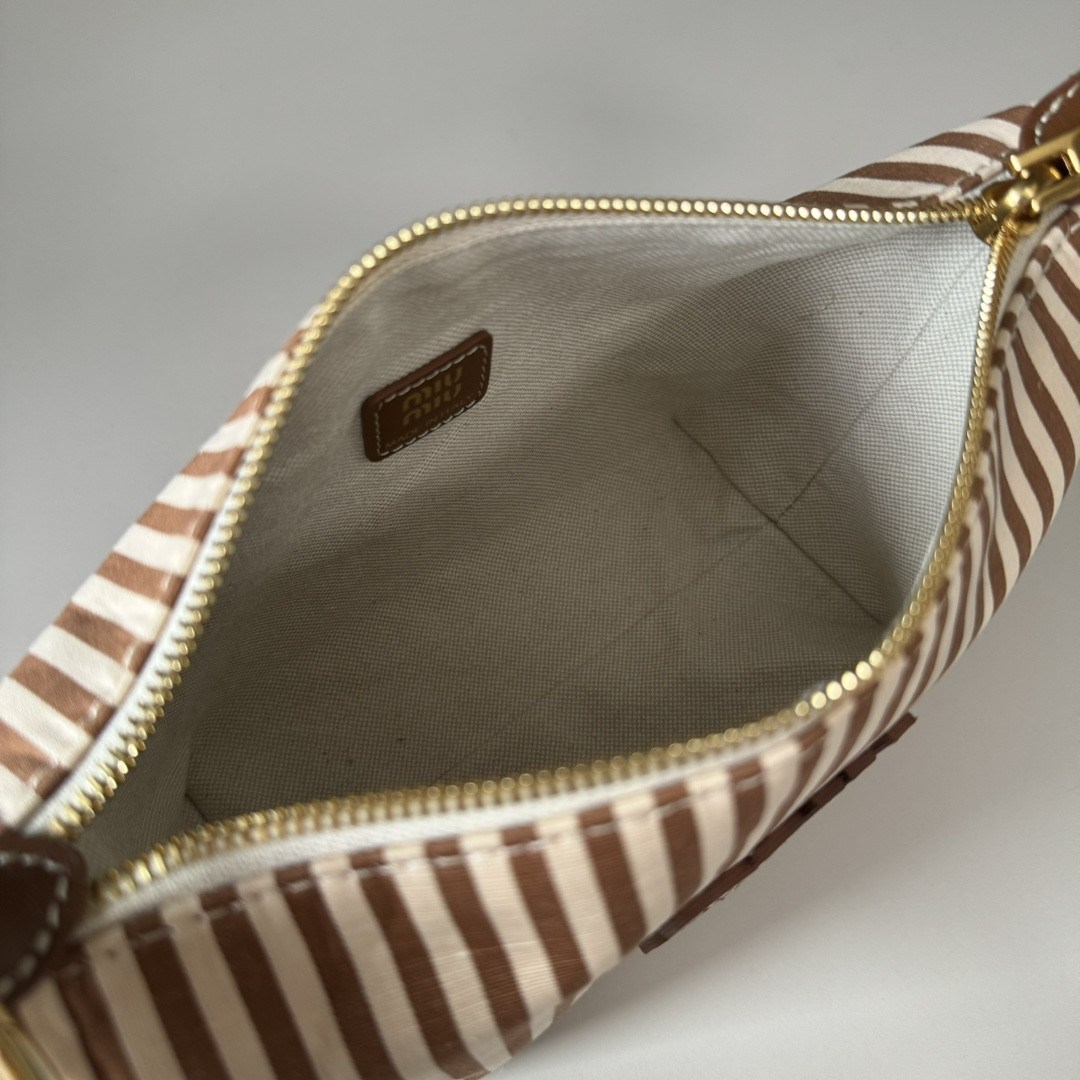 Miu Miu Jacquard fabric pouch with logo 14x18.5x10cm